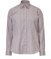 Neutral-hued stripes cover this stylish button down from Etro, adding sleek appeal to your workweek look - Spread collar, front button placket, curved hem, slim fit, all-over stripe print - Wear with jeans, chinos, or trousers