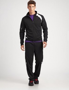 This versatile, interlock knit track jacket has a smooth finish and soft hand.Zip-frontFront slash pocketsGraphic logo detailPolyesterMachine washImported