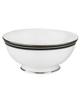 In the hands of kate spade, black and white is anything but basic. Dancing ebony stitched stripes provide a stunning contrast to the pristine china of the Union Street fruit bowl (shown back).
