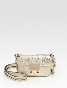 Be the star of the party with this unique light-up design in luxurious crinkled leather.Detachable shoulder strap, 24½ dropPush-lock flap closureOne inside zip pocket with additional battery packCotton lining5W X 3½H X 2¼DImported