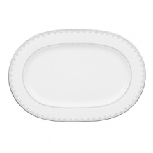 White Lace bone china is characterized by its diverse series of borders all rendered in precious platinum. The classic combination of platinum and white radiates on the table. A truly classic look.