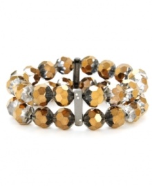 Double take. Two-tone bronze and silver faceted cherry beads and a double-row silhouette stand out on this stylish stretch bracelet from Kenneth Cole New York. Embellished with sparkling crystal accents, it's crafted in hematite tone mixed metal. The stretch design makes it a comfortable, effortless choice. Approximate length: 7-1/2 inches. Double take. Two-tone bronze and silver faceted cherry beads and a double-row silhouette stand out on this stylish stretch bracelet from Kenneth Cole New York. Embellished with sparkling crystal accents, it's crafted in hematite tone mixed metal. The stretch design makes it a comfortable, effortless choice. Approximate length: 7-1/2 inches.