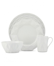 A cut above. The Castle Peak place setting presents an ultra-modern take on kate spade new york's signature bow motif featuring bold faceted accents in cream-colored stoneware.