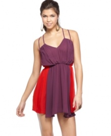 Sean John plays the ultimate style master, mixing vivid stripes, spaghetti straps and a fluid silhouette in a dress that appeals to the fashionista! Sean John plays the ultimate style master, mixing vivid stripes, spaghetti straps and a fluid silhouette in a dress that appeals to the fashionista!