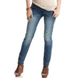Extreme whiskering and bold topstitching enhance these medium wash skinny jeans with eye-catching style! From Dollhouse. Extreme whiskering and bold topstitching enhance these medium wash skinny jeans with eye-catching style! From Dollhouse.