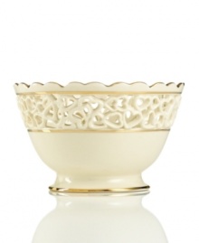 Distinguished by a scalloped edge, bands of gold and heart cutouts in creamy ivory porcelain, this lovely bowl combines traditional style and timeless grace. Qualifies for Rebate Distinguished by a scalloped edge, bands of gold and heart cutouts in creamy ivory porcelain, this lovely bowl combines traditional style and timeless grace. Qualifies for Rebate
