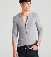 With an extra long placket this henley from Michael Kors grounds your look with a masculine edge.
