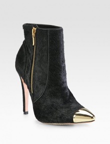 Towering silhouette of luxe pony hair, pumped up with a metal cap toe and exposed zipper. Self-covered heel, 4¼ (110mm)Pony upper with metal cap toeSide exposed zipLeather lining and solePadded insoleImported Towering silhouette of luxe pony hair, pumped up with a metal cap toe and exposed zipper. Self-covered heel, 4¼ (110mm)Pony upper with metal cap toeSide exposed zipLeather lining and solePadded insoleImported