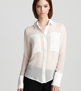 Light as air and sheer perfection, this Aqua top is an elegant complement to classic pencil skirts or trouser pants.
