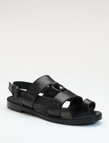 Wide straps of rich leather attached to a bold ring in a sporty flat with a front toe loop.Stacked heel, ¾ (20mm) Front toe loop Buckle slingback strap Leather lining and sole Padded insole Made in ItalyOUR FIT MODEL RECOMMENDS ordering one half size up as this style runs small. 