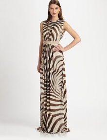This fluid, floor-length design gets its exotic edge from a bold animal print.Jewel necklineSleevelessGathered bodice and skirtContrast banded waist Concealed back zipFully linedAbout 54 longViscoseDry cleanMade in Italy of imported fabricModel shown is 5'10 (177cm) wearing US size Small. 