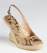 A fashion-forward silhouette usually reserved for evening is updated for day by Andre Assous--the Bev slingback wedges boast a unique curved cut-out heel and python embossed leather.