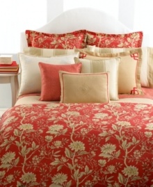 A lively, chinoiserie-inspired pattern adorns Lauren Ralph Lauren's Villa Camelia cotton decorative pillow in a bold paprika hue for a chic and inviting result.