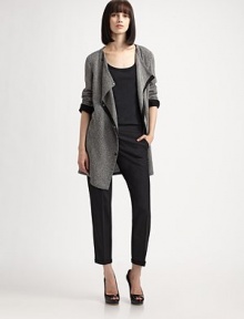 Finespun wool, with a hint of stretch for an ultra-flattering fit.Zip fly with tab hook-and-bar closureSide slash pocketsBack welt pocketsCropped, cuffed legsInseam, about 26½97% wool/3% elastaneDry cleanImported of Italian fabricModel shown is 5'9 (175cm) wearing US size 4. Finespun wool, with a hint of stretch for an ultra-flattering fit.Zip fly with tab hook-and-bar closureSide slash pocketsBack welt pocketsCropped, cuffed legsInseam, about 26½97% wool/3% elastaneDry cleanImported of Italian fabricModel shown is 5'9 (175cm) wearing US size 4.