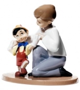 Pinocchio takes his first steps to becoming a real boy in this collectible figurine inspired by the Disney classic. Handmade in Nao by Lladro porcelain.