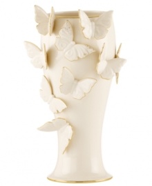 The essence of whimsy, this Lenox Flutter vase will lift your spirits with gold-tipped butterflies and elegant banding in timeless ivory porcelain. The essence of whimsy, this Lenox Flutter vase will lift your spirits with gold-tipped butterflies and elegant banding in timeless ivory porcelain.