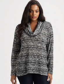 There is so much you will love about this design, including classic stripes and a feminine neckline.CowlneckHi-lo hemBack yokePull-on styleAbout 28 from shoulder to hemPolyester/rayon/spandexMachine washMade in USA