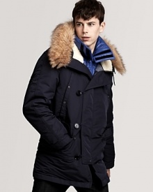 A cozy parka with a cozy faux fur-trimmed hood and a detachable, lightly-quilted long sleeve lining, which can be worn alone. A cozy parka with a cozy faux fur-trimmed hood and a detachable, lightly-quilted long sleeve lining, which can be worn alone.