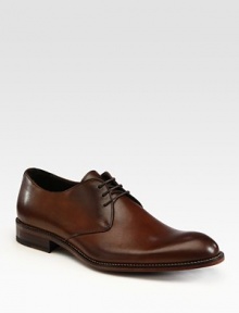 Workday comfort and style are united in handsomely burnished leather with durable rubber soles. Leather lining Padded insole Rubber sole Made in Italy 