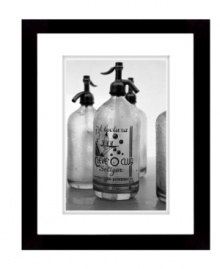 Fitting for the kitchen or bar, this retro-cool wall art depicts vintage seltzer bottles in black and white. Matted and framed in black wood for sophisticated polish from Lauren by Ralph Lauren. Fitting for the kitchen or bar, this retro-cool wall art depicts vintage seltzer bottles in black and white. Matted and framed in black wood for sophisticated polish from Lauren by Ralph Lauren.