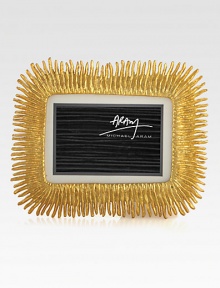Showcase your most cherished photos in this exuberant, handcrafted frame.From the Flights of Fancy CollectionGold plateFits 8 X 10 photos13.5W X 11HImported