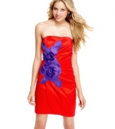 Sporting a contrast-color rosette applique over a chic wrap design, this party dress from Sequin Hearts pairs fun detail with trend-right style!
