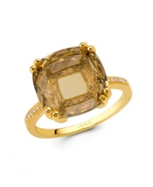 Gold standard. A large-scale, golden brown-hued cubic zirconia with sparkling cubic zirconia accents (5-7/8 ct. t.w.) stands out as a dramatic decorative detail on this stunning ring from CRISLU. Crafted in 18k gold over sterling silver, it's an elegant addition for your fall wardrobe. Size 7. Gold standard. A large-scale, golden brown-hued cubic zirconia with sparkling cubic zirconia accents (5-7/8 ct. t.w.) stands out as a dramatic decorative detail on this stunning ring from CRISLU. Crafted in 18k gold over sterling silver, it's an elegant addition for your fall wardrobe. Size 7.