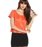 Shine on in a cropped sequin top from Material Girl! The bold color looks great paired with your dark or black jeans, too.