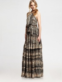 Silky-smooth fabric in a bold cheetah print with a dramatic open back and floor-sweeping hem. Jewelneck with self-tieSleevelessAllover cheetah printSeam waistband with self-tie belt and horizontal pleatsOpen backBack zip closureAbout 60 from shoulder to hem60% rayon/40% silkDry cleanImportedModel is 5'9½ (176cm) wearing a US size 4. Silky-smooth fabric in a bold cheetah print with a dramatic open back and floor-sweeping hem. Jewelneck with self-tieSleevelessAllover cheetah printSeam waistband with self-tie belt and horizontal pleatsOpen backBack zip closureAbout 60 from shoulder to hem60% rayon/40% silkDry cleanImportedModel is 5'9½ (176cm) wearing a US size 4.