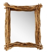The enchanting Forest mirror from Palecek does wonders for any interior, with a thick frame crafted of natural teak, acacia and mango-wood twigs.