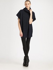 It's all about structure and texture. This warm design is so on trend because of its rib-knit, kimino-inspired styling.TurtleneckKimono sleevesPull-on styleRib knit45% wool/25% alpaca/30% acrylicDry cleanImported Model shown is 5'10 (177 cm) wearing US size Small. 