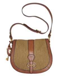 A lush carryall with a classic girl-meets-boy look. You'll fall in love with this textured cotton and rich leather Vintage Re-Issue flap bag by Fossil.