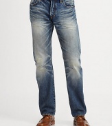 Standard straight-leg fit in lightly washed denim, updated with folded back pocket detail and mild distressing for a downtown edge.Five-pocket styleInseam, about 34CottonMachine washImported
