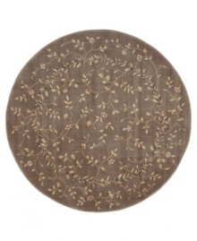 A beautiful lattice of delicate vines and blooming flowers gives this rug its magnetic charm. On a dark khaki ground with soft ivory accents, this densely woven piece invites you into wonderful interior decor. A beautiful lattice of delicate vines and blooming flowers gives this rug its magnetic charm. On a dark khaki ground with soft ivory accents, this densely woven piece invites you into wonderful interior decor.
