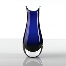 A uniquely artful piece that's mouth blown, then cut and polished by hand, bringing modern sophistication and a touch of the sublime into your home. A uniquely artful piece that's mouth blown, then cut and polished by hand, bringing modern sophistication and a touch of the sublime into your home.