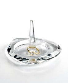 Show some love. This precious glass ring holder from Oleg Cassini is meticulously handcrafted in a heart shape that dazzles with faceted cuts. Hallmarked with designer's signature. Show some love. This precious glass ring holder from Oleg Cassini is meticulously handcrafted in a heart shape that dazzles with faceted cuts. Hallmarked with designer's signature.