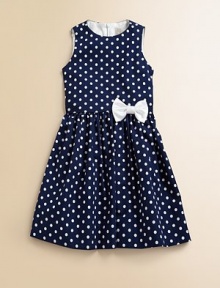 Connecting the dots will lead you to this standout frock with dainty bow detail, creating a soirée perfect ensemble.JewelneckSleevelessBack zipperFull skirtCottonDry cleanMade in the USA