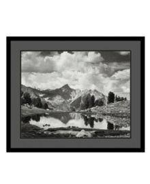 Time appears to stand still in this stunning print from renowned photographer Ansel Adams. Taken in 1925 in the Sierra Nevada mountains, the image pairs crystal-clear elements of earth, air and water for a gorgeous, truly ethereal result. Time appears to stand still in this stunning print from renowned photographer Ansel Adams. Taken in 1925 in the Sierra Nevada mountains, the image pairs crystal-clear elements of earth, air and water for a gorgeous, truly ethereal result.