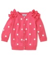 Ruffles at the shoulders and crystal front buttons perk up this already chic polka dot sweater.
