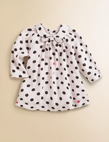 A precious cotton frock with Peter Pan collar and bold polka dots for your little girl.Peter Pan collar with bow tieLong sleevesBack buttonsCottonMachine washImported Please note: Number of buttons may vary depending on size ordered. 