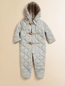 Snuggle-into warmth joins Burberry style in a cozy one-piece of soft, quilted jersey to keep your little one warm from head to toe.Hood with button neck tabStand collarHidden front zipper under toggle-and-rope placketCheck liningCottonMachine washImportedAdditional InformationKid's Apparel Size Guide Snuggle-into warmth joins Burberry style in a cozy one-piece of soft, quilted jersey to keep your little one warm from head to toe.Hood with button neck tabStand collarHidden front zipper under toggle-and-rope placketCheck liningCottonMachine washImportedAdditional InformationKid's Apparel Size Guide