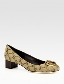 Logo-print canvas pump fronted by an interlocking GG adornment. Stacked heel, 1½ (40mm)Canvas upperLeather lining and solePadded insoleMade in Italy