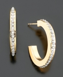 Elegance for every day. Sparkling diamond accents add a row of shimmer to classic 14k gold demi-hoop earrings.