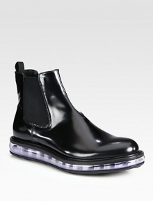 Elevated sophistication defines this chelsea boot crafted in polished spazzolato leather with side elastic gores and a transparent cushioned sole for maximum comfort.Leather upperLeather liningRubber soleMade in Italy