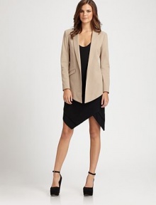 A design tailored to provide a feminine fit while maintaining a fashion-forward presence with the help of an angled hem.Shawl collarFlap front pocketAbout 24 from shoulder to hem92% cotton/8% elastaneDry cleanMade in USA of imported fabric Model shown is 5'9½ (176cm) wearing US size 4. A design tailored to provide a feminine fit while maintaining a fashion-forward presence with the help of an angled hem.Shawl collarFlap front pocketAbout 24 from shoulder to hem92% cotton/8% elastaneDry cleanMade in USA of imported fabric Model shown is 5'9½ (176cm) wearing US size 4.