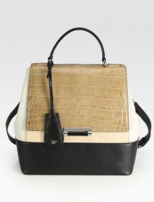 Crocodile embossed leather, snake embossed leather and smooth leather come together in a colorblock design.Top handle, 4½ dropDetachable adjustable shoulder strap, 19-21½ dropPush-clasp flap closureCenter stud strapProtective metal feetOne outside zip pocketOne inside zip pocketThree inside open pocketsFully lined10W X 11½H X 4¾DImported