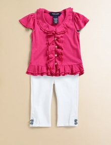 Layered ruffles embellish this ultra-soft button-front top that features girly flutter sleeves for a playful touch.ScoopneckShort flutter sleevesFront button-loop placketLayered ruffle trim along neck, buttons and hem60% cotton/40% polyesterMachine washImported Please note: Number of buttons may vary depending on size ordered. 