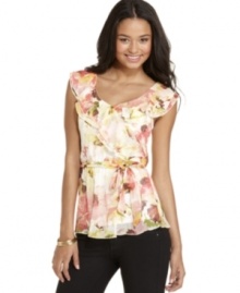 Be the master of dainty style with this chiffon top from BCX that pairs sweetly tiered ruffles with a picturesque floral print! Be the master of dainty style with this chiffon top from BCX that pairs sweetly tiered ruffles with a picturesque floral print!