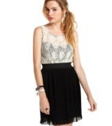 Miss Chevious joins a lace top with a skirt of fine pleats on a dress that's all about layered elegance!