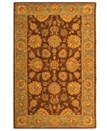 Bold colors, classic patterns. Featuring a traditional vine-and-blossom motif inspired by ancient Persian designs, this area rug from Safavieh adds a touch of drama and heirloom elegance any living space. Tufted in India from pure wool, it's sure to set just the right tone. (Clearance) Bold colors, classic patterns. Featuring a traditional vine-and-blossom motif inspired by ancient Persian designs, this area rug from Safavieh adds a touch of drama and heirloom elegance any living space. Tufted in India from pure wool, it's sure to set just the right tone. (Clearance)